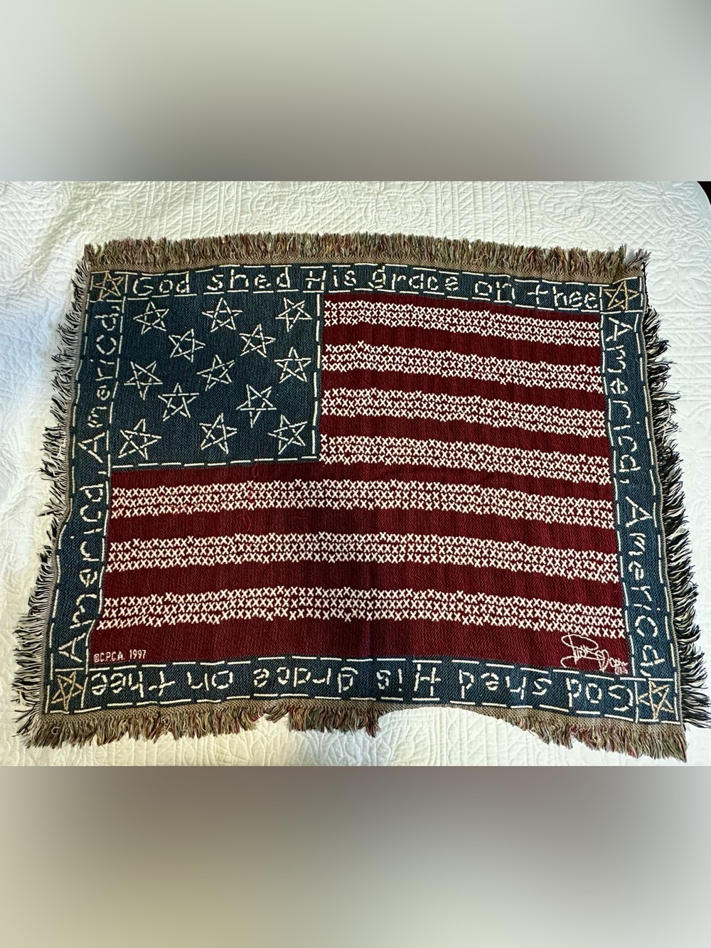 Vintage 1997 CPCA American Flag tapestry throw blanket.